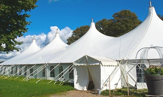 high-quality portable restrooms stationed at a wedding, meeting the needs of guests throughout the outdoor reception in Wynnewood